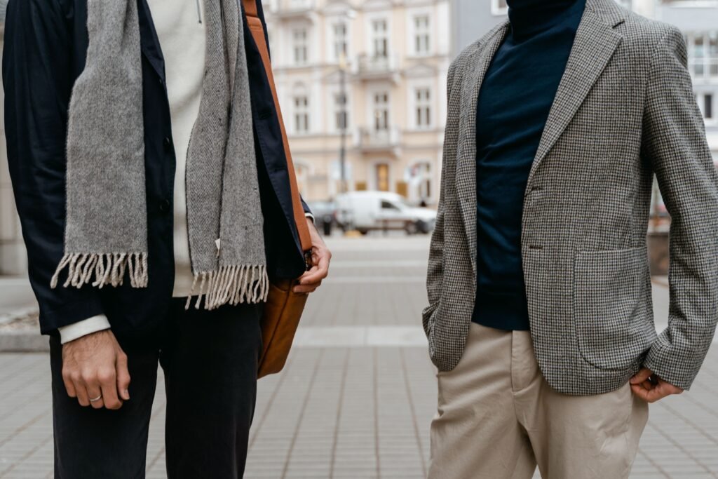 Old money style for men with navy blazer and beige trousers